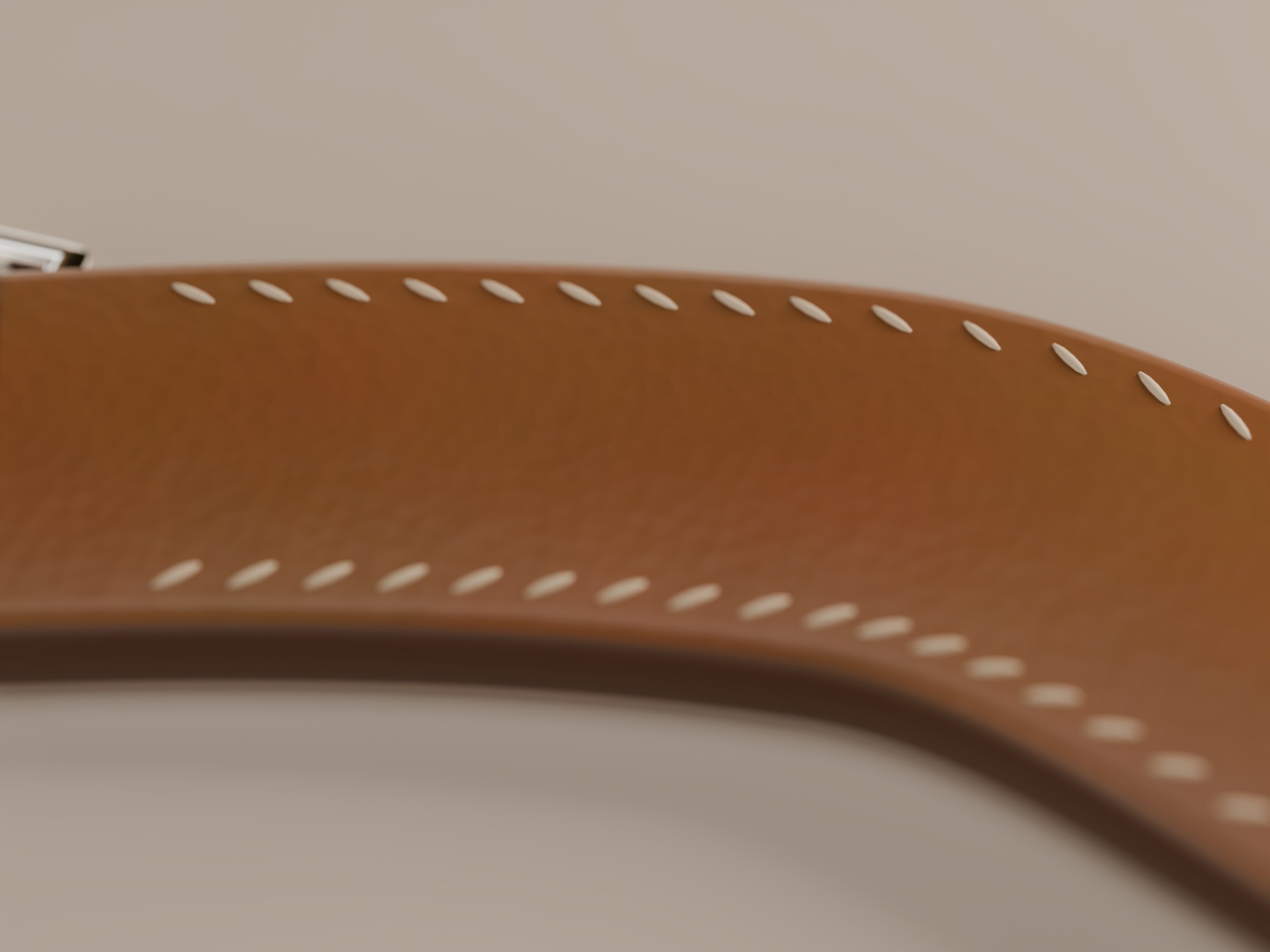 Hand-stitched cognac leather strap close up