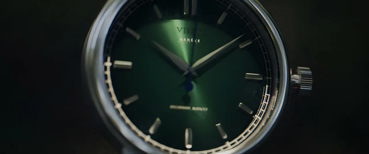 Still Running: a green-dial automatic watch, close up